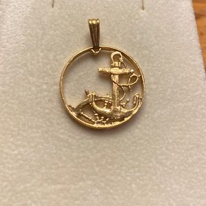 Gold anchor pendant made from coin